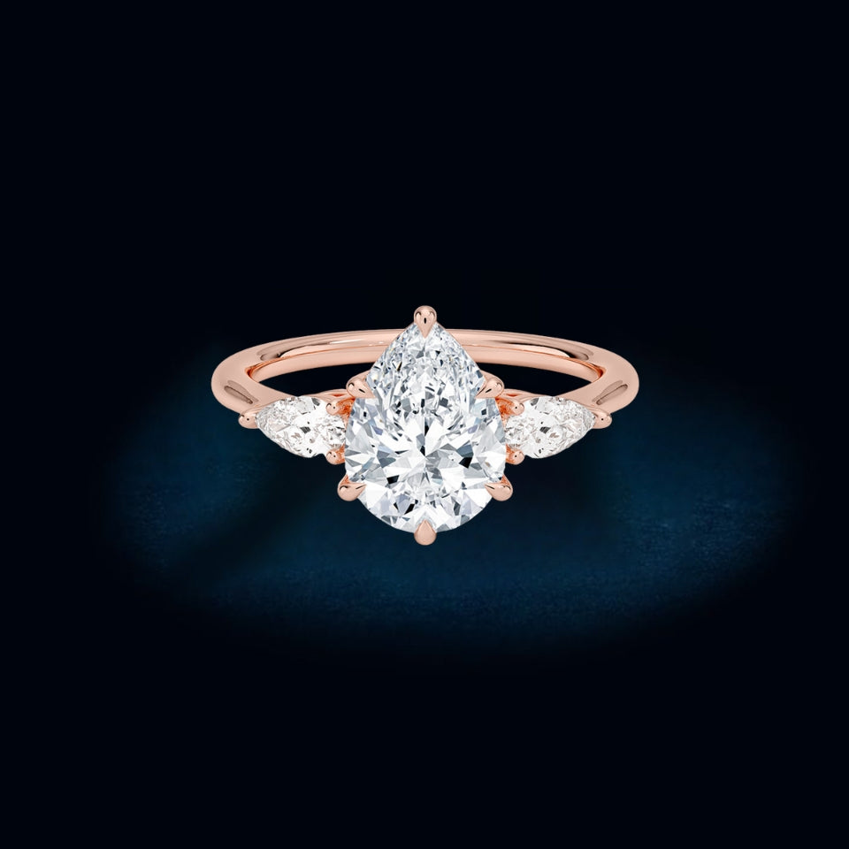 Moissanite Pear Three Stone Ring