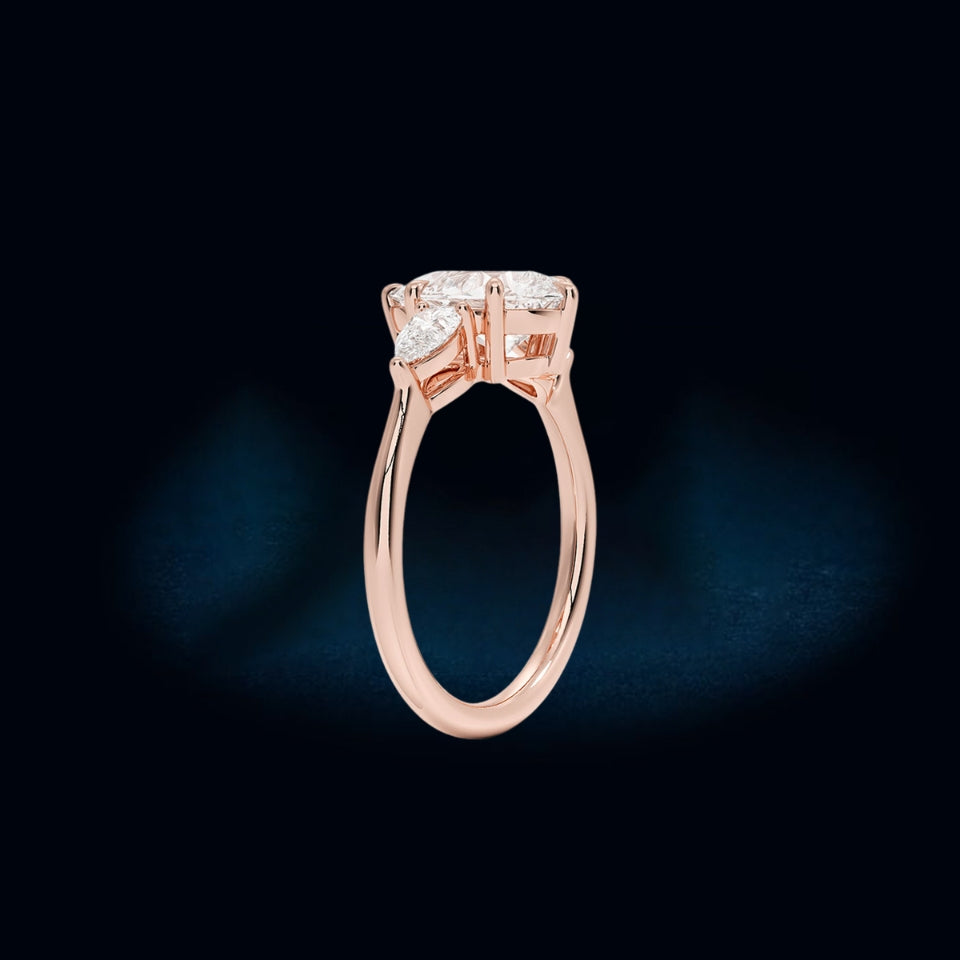 Moissanite Pear Three Stone Ring
