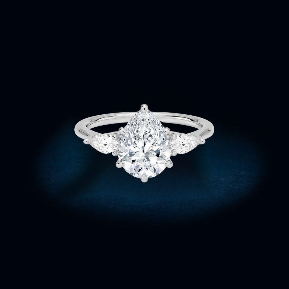 Moissanite Pear Three Stone Ring