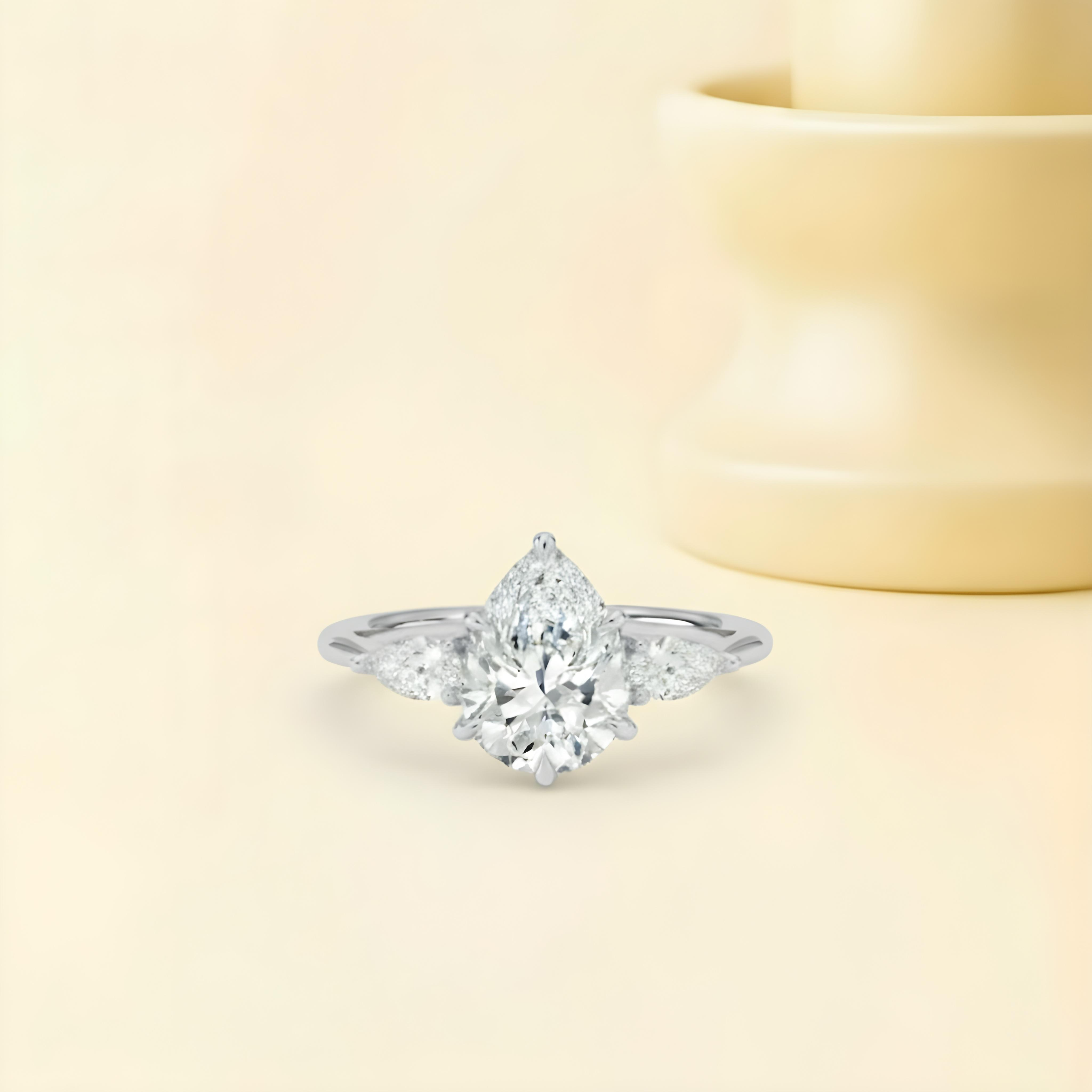 Moissanite Pear Cut Three Stone Ring