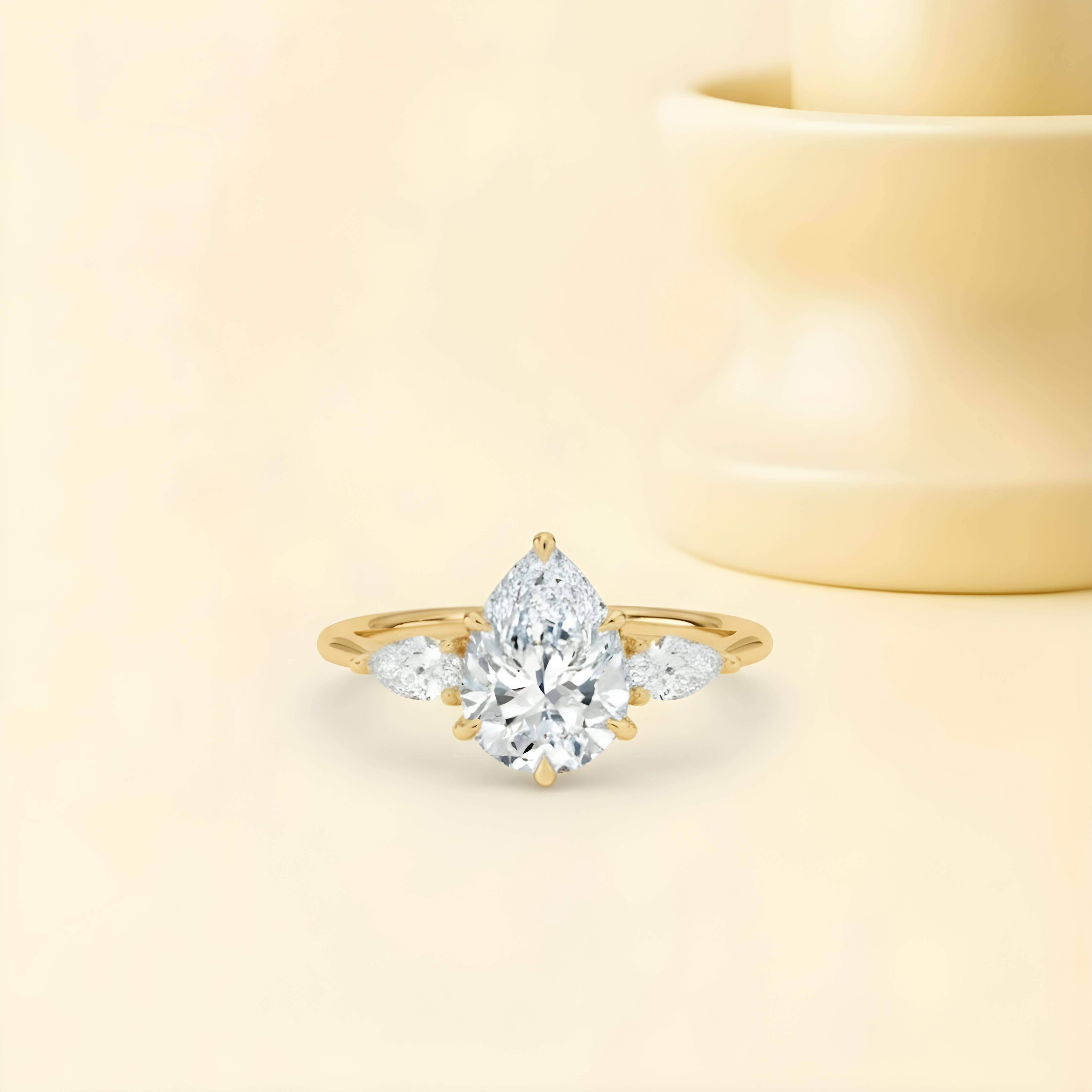 Moissanite Pear Cut Three Stone Ring