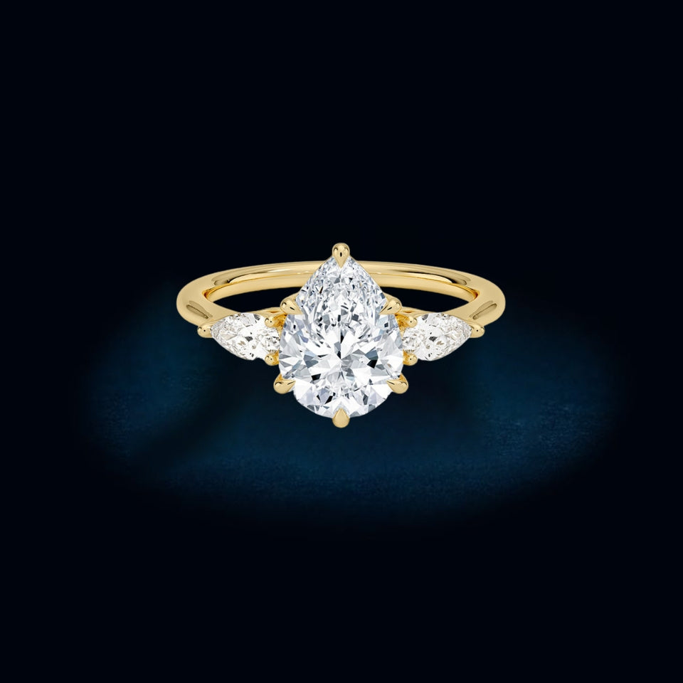 Moissanite Pear Three Stone Ring